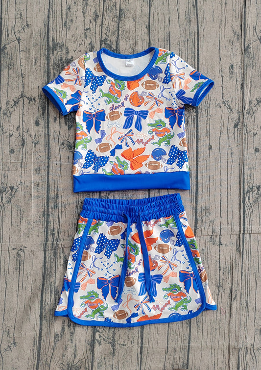 NO MOQ preorder GSD3698 GO TEAM Crocodile Football Orange Purple Bow Short Sleeve Top with Skirts for Girls Yoga Sets 202602