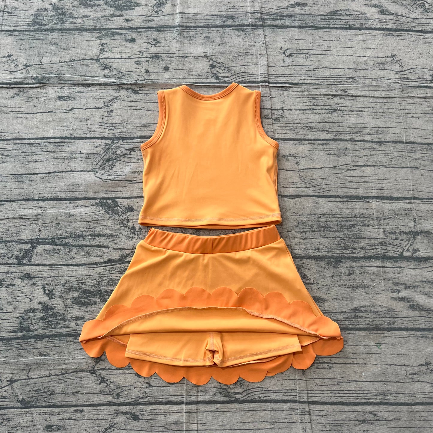 NO MOQ preorder GSD4081 Solid Dark Light Orange Wave Ruffle Sleeveless Top with Skirts for Girls Yoga Sets 202605