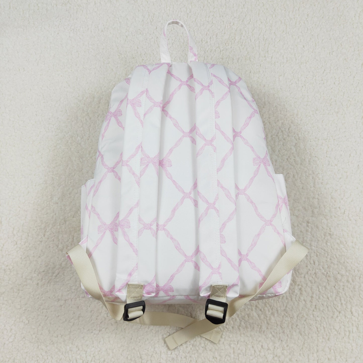 BA0225 Pink and white backpack with bow design