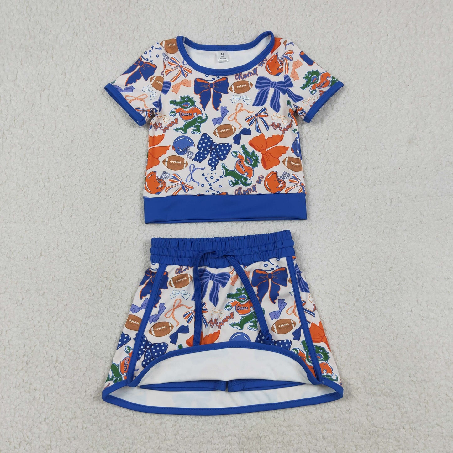 GSD3698 GO TEAM Crocodile Football Orange Purple Bow Short Sleeve Top with Skirts for Girls Yoga Sets 202604 RTS