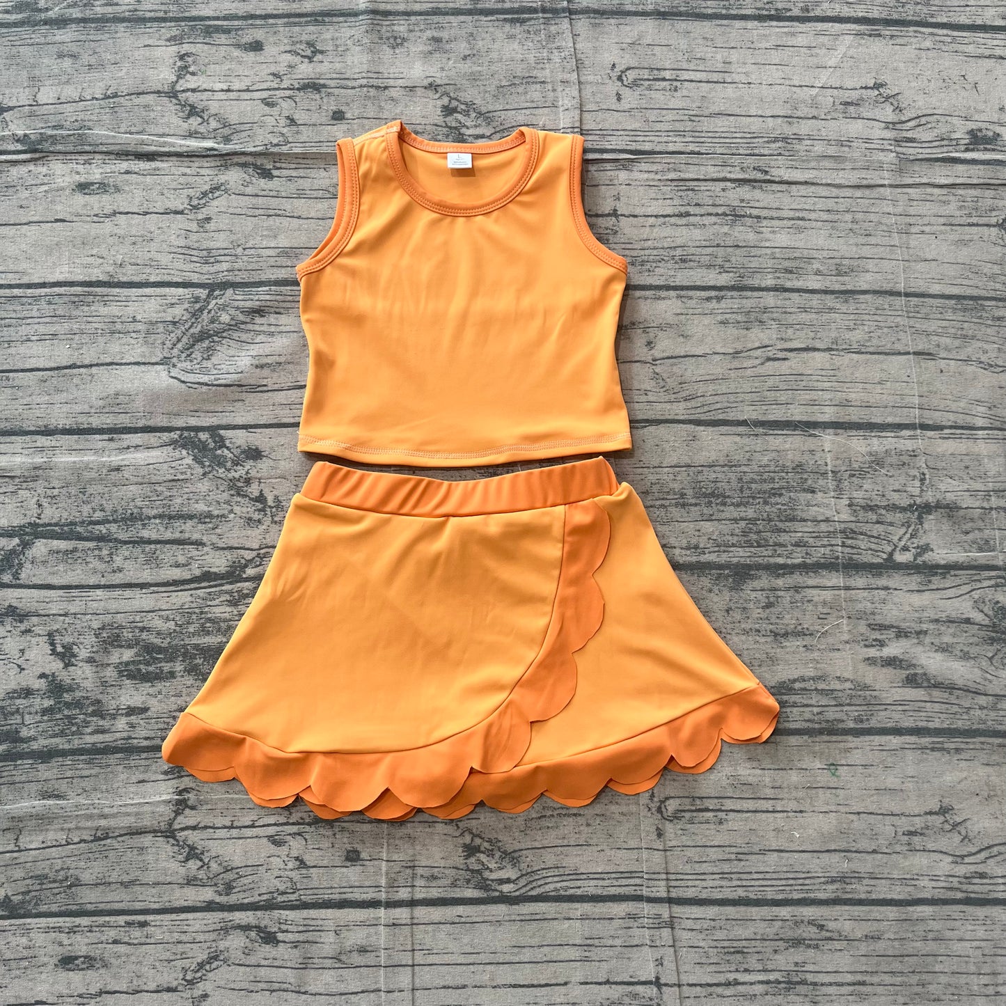 NO MOQ preorder GSD4081 Solid Dark Light Orange Wave Ruffle Sleeveless Top with Skirts for Girls Yoga Sets 202605