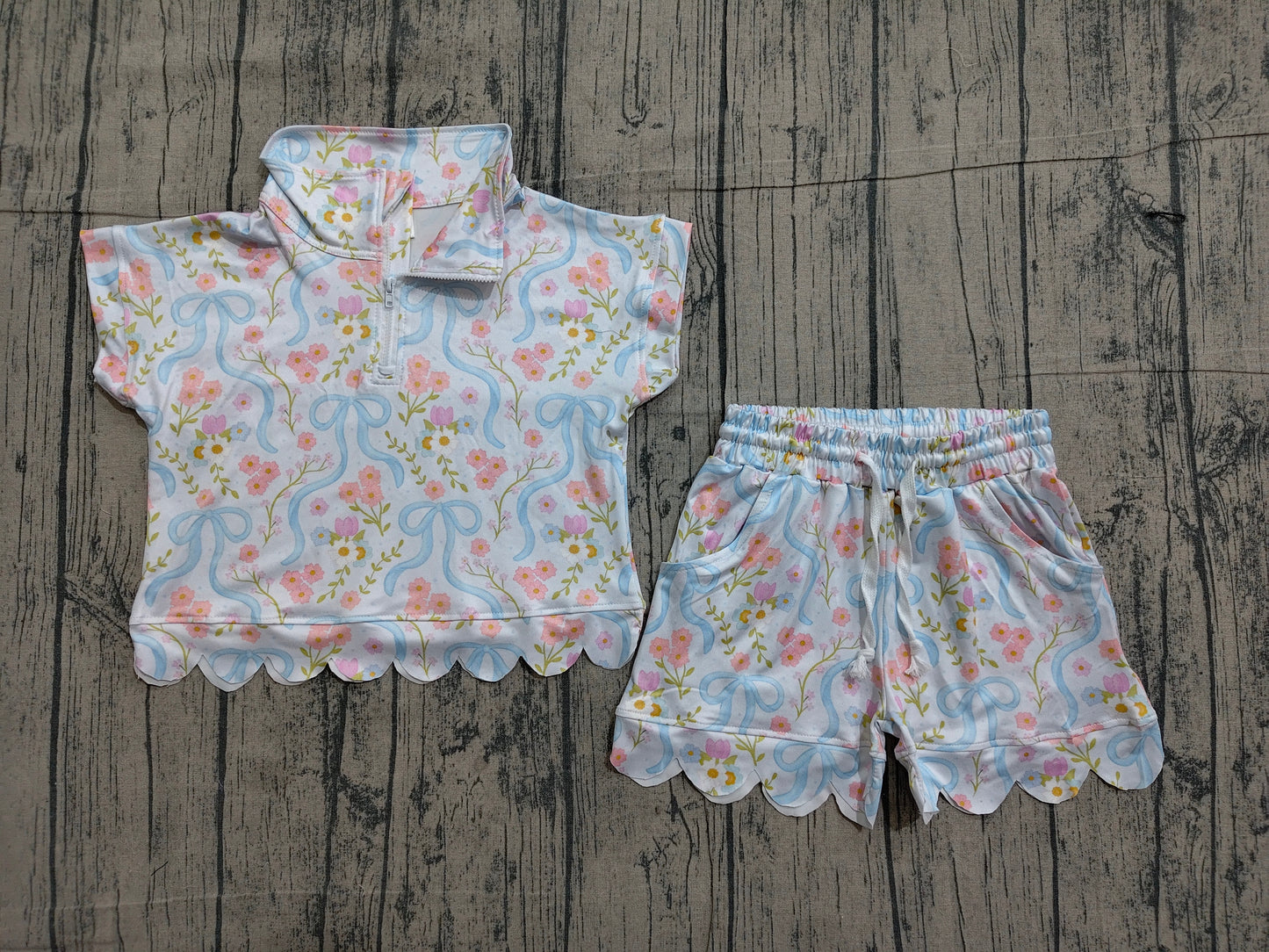 NO MOQ Preorder GSSO3575 Pink Flower Blue Bows Zip Wave Ruffle Short Sleeve Shorts Girls Sets 202603